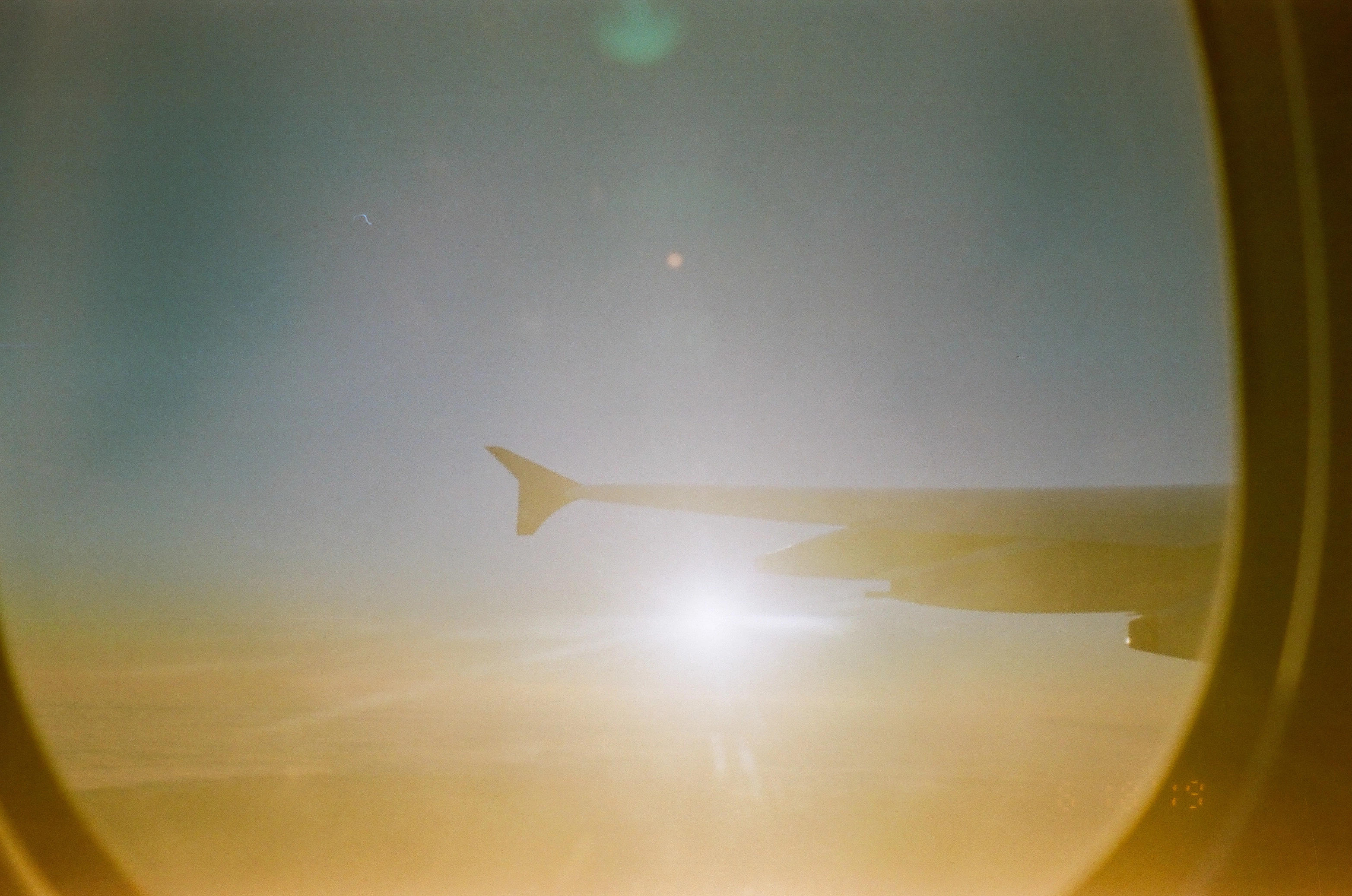 A photo of the sun from an airplane