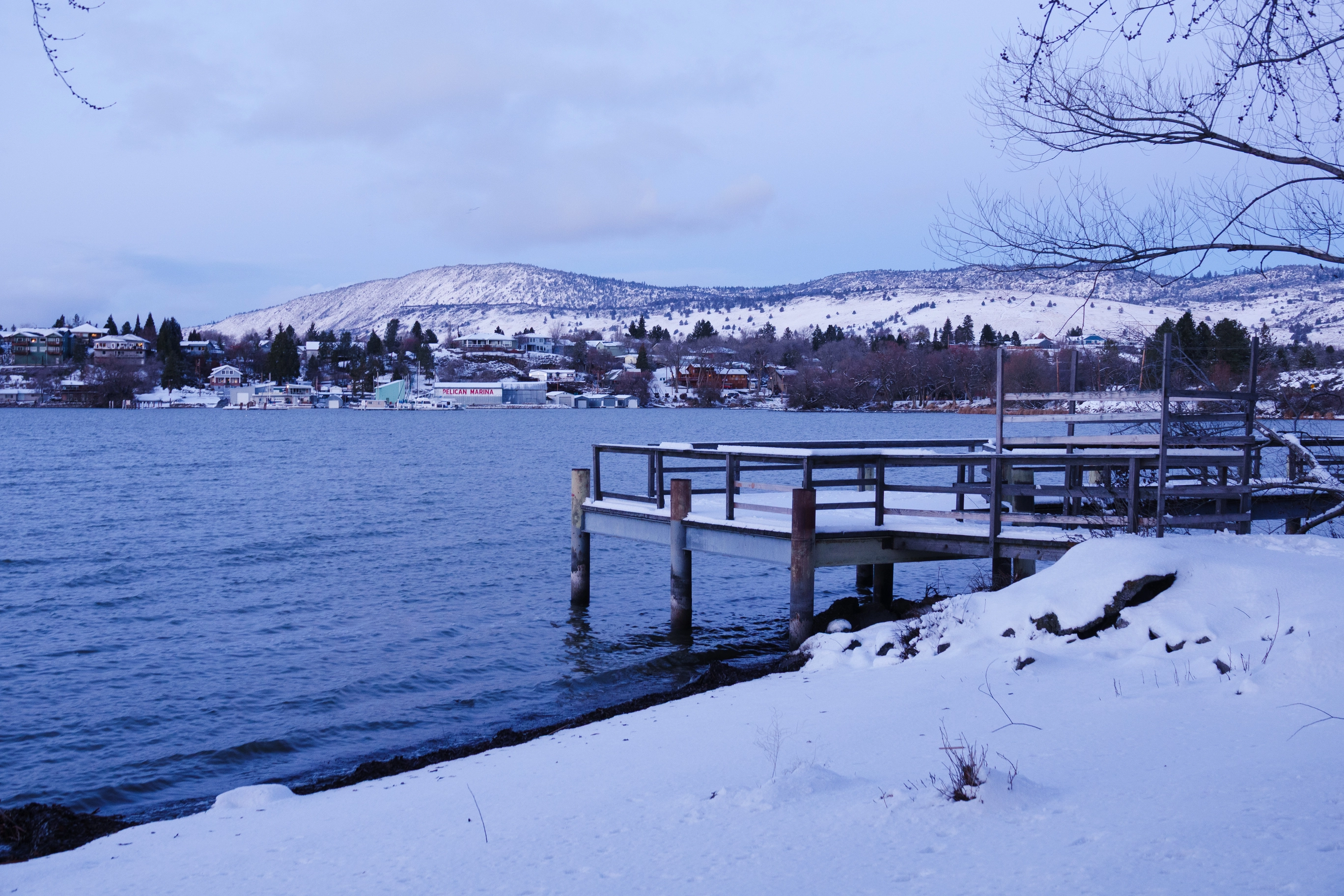 A photo of a snow-covered dock