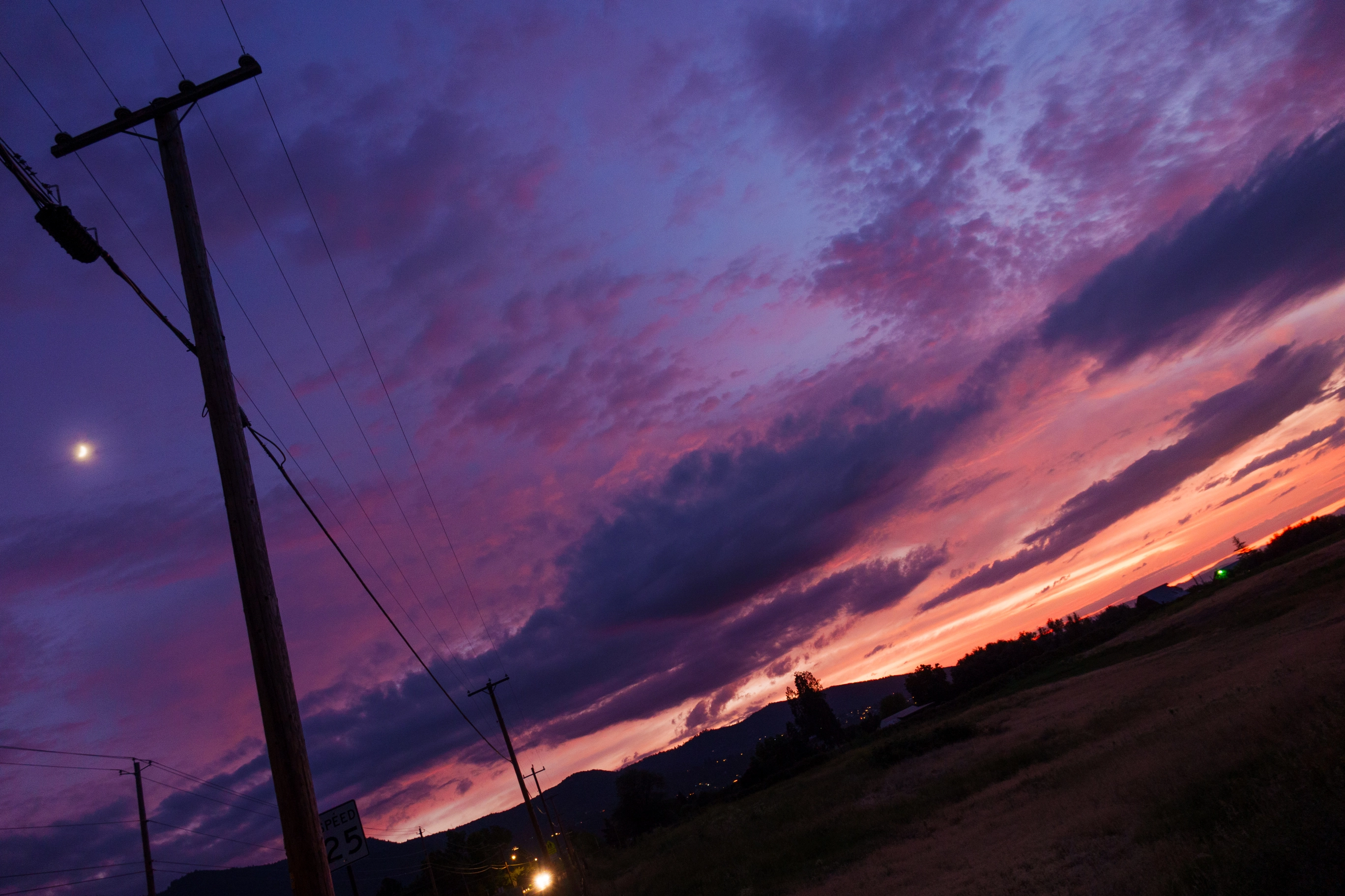 A photo of a beautiful sunset and power lines